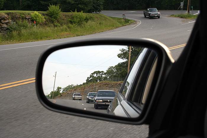 Objects in mirror are larger than they appear.